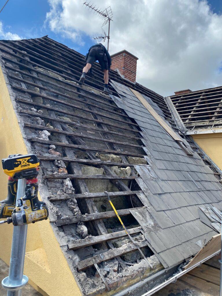 Signs you need a new roof - damaged slates and roof inspection Dublin