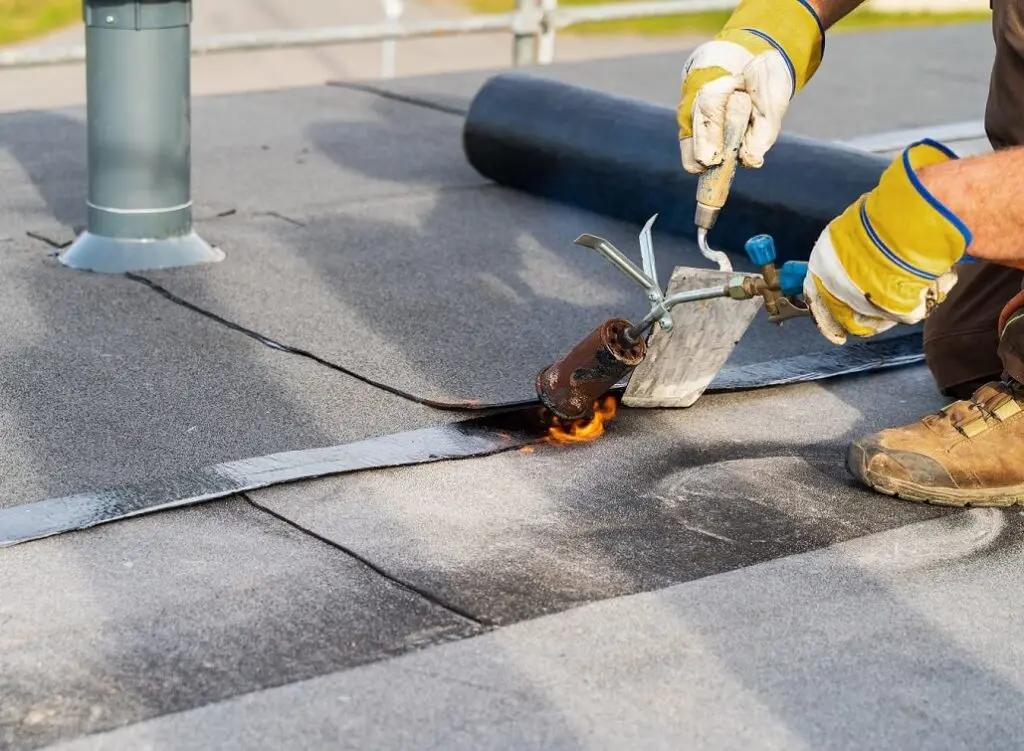 Flat roof installation by MC Roofing & Cleaning Services